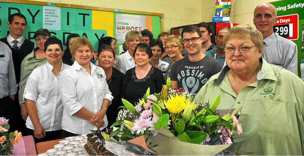 KEEPING IT FRESH: Gloria Bowles celebrates her retirement and last shift with her Woolworths colleagues. KEEPING IT FRESH: Gloria Bowles celebrates her retirement and last shift with her Woolworths colleagues.